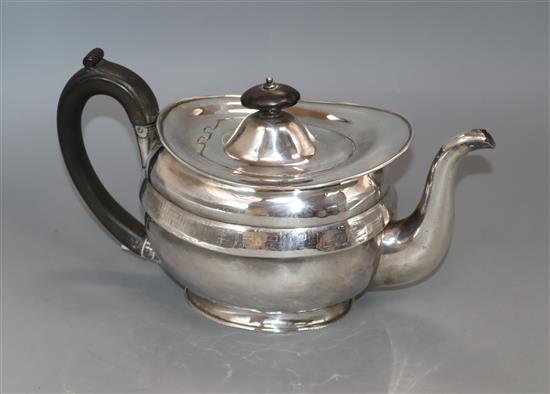 A George III silver teapot, London 1806, maker Soloman Hougham, gross 19 oz.